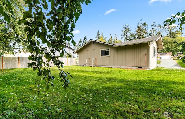 exterior space with a yard