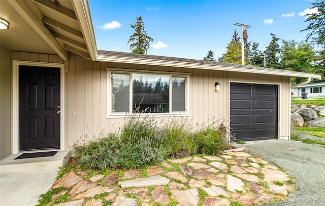 exterior space with a garage