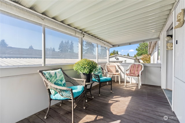 sunroom / solarium featuring plenty of natural light