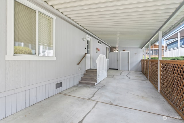 view of patio / terrace with a carport