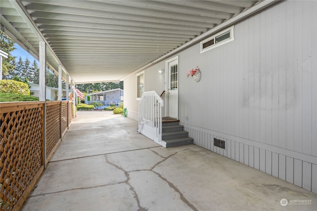 view of patio / terrace featuring a carport