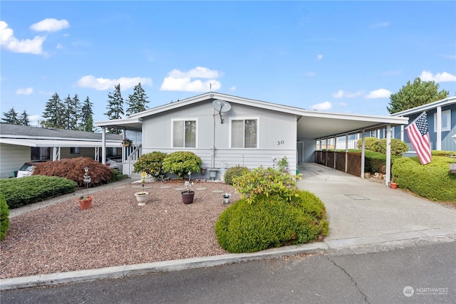 view of front of house with a carport