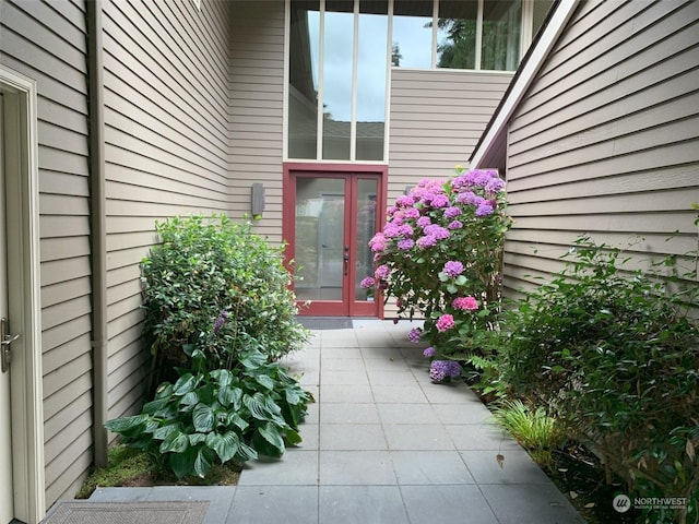 property entrance featuring french doors