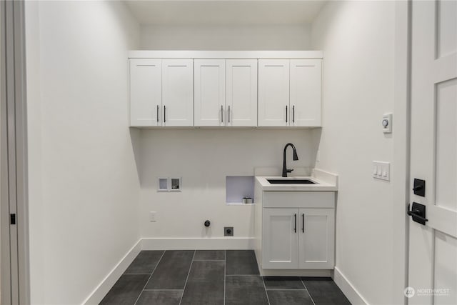 laundry room featuring electric dryer hookup, gas dryer hookup, cabinets, sink, and washer hookup