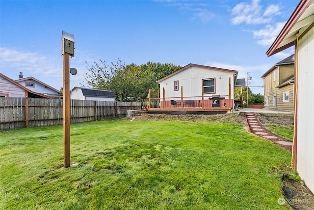 view of yard with a deck