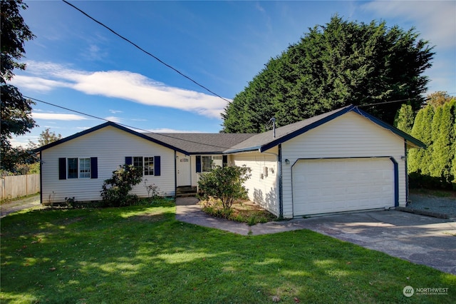 ranch-style home with a garage and a front lawn