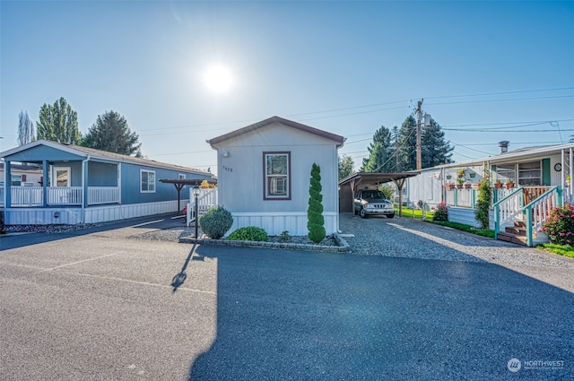 manufactured / mobile home with a carport