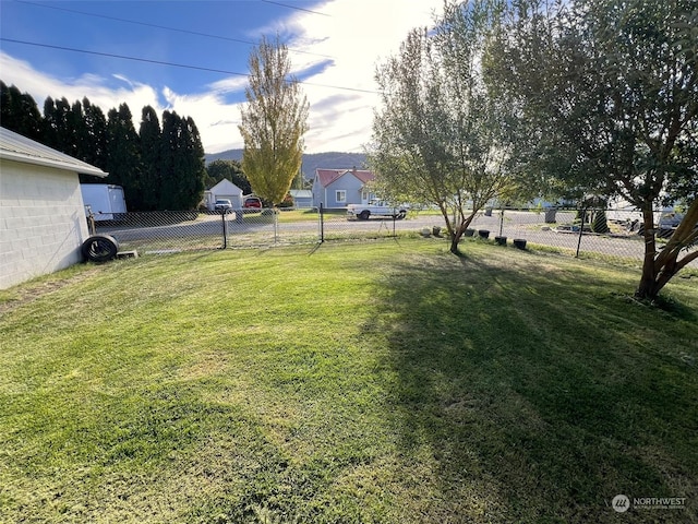 view of yard with fence
