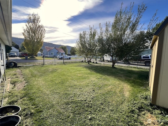 view of yard featuring fence