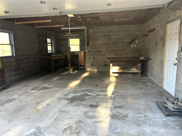 below grade area with concrete block wall