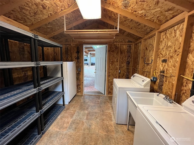 washroom with washer and clothes dryer