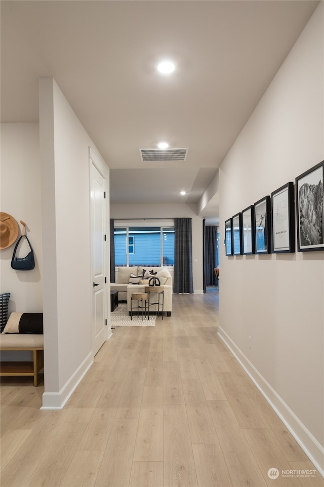 hallway featuring light wood-type flooring