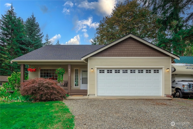 view of front facade featuring a garage and a porch