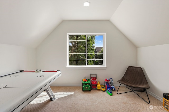 rec room with lofted ceiling and carpet floors