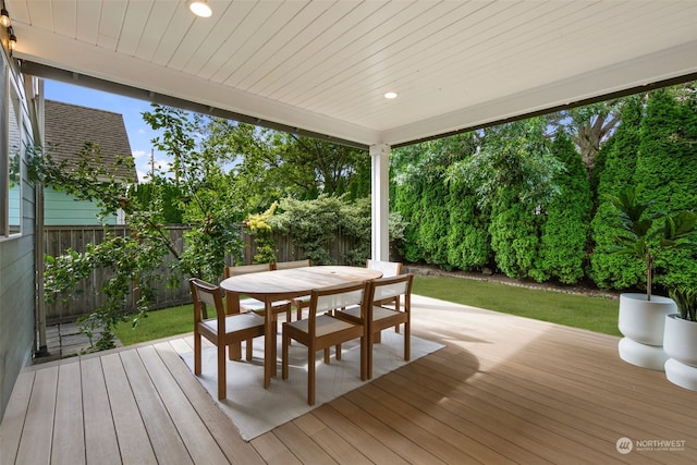 1925 32nd Avenue Ct SW, Puyallup, WA 98373 - wooden terrace featuring outdoor dining space, a fenced backyard, and a lawn