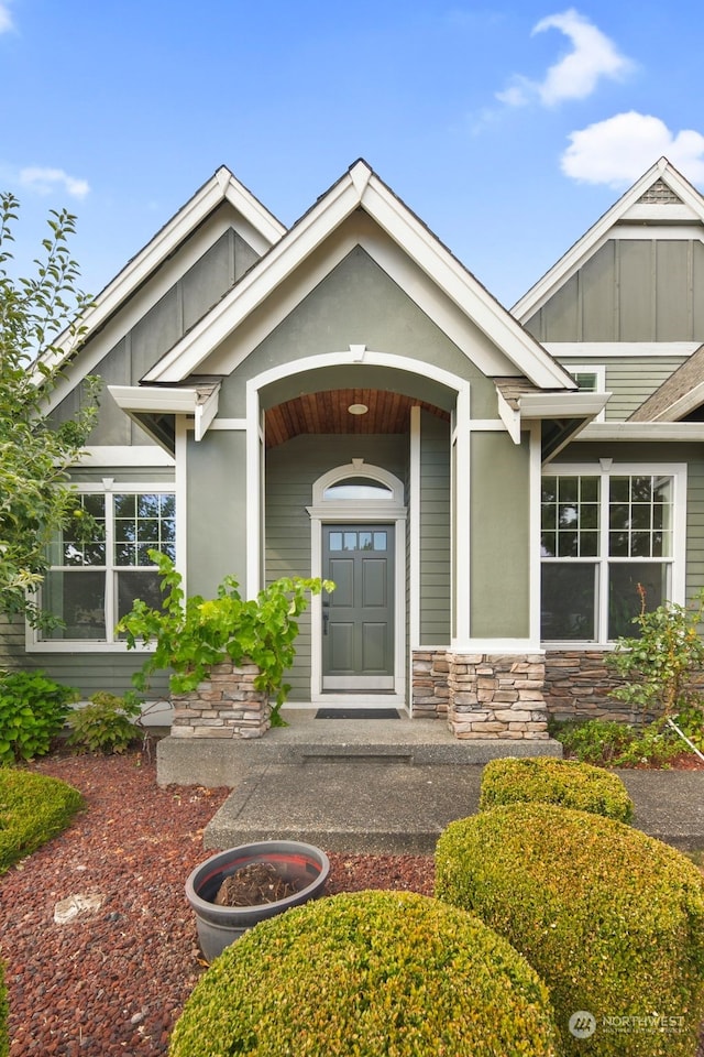 1925 32nd Avenue Ct SW, Puyallup, WA 98373 - doorway to property featuring stucco siding and stone siding