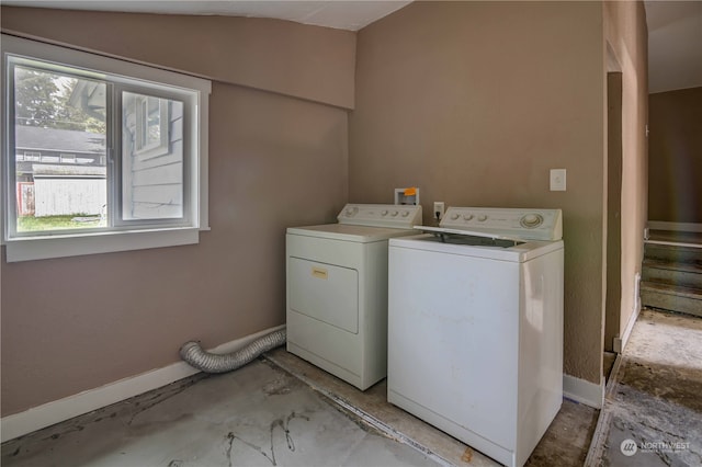 washroom with independent washer and dryer