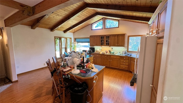 kitchen featuring light hardwood / wood-style flooring, wood ceiling, white refrigerator, and decorative light fixtures