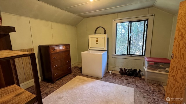 laundry area with dark colored carpet