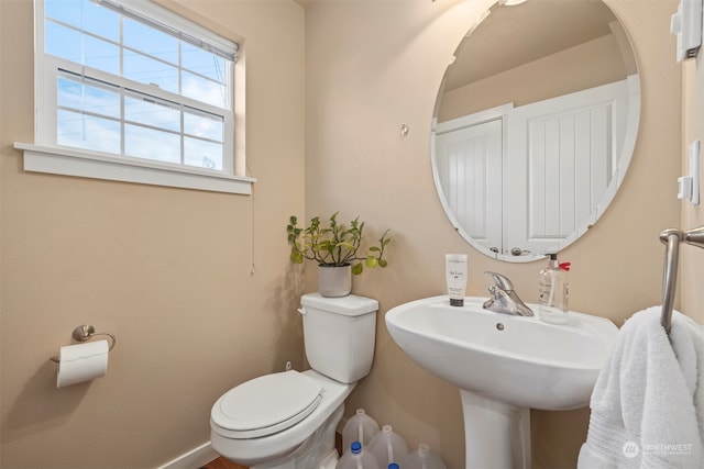 bathroom with sink and toilet