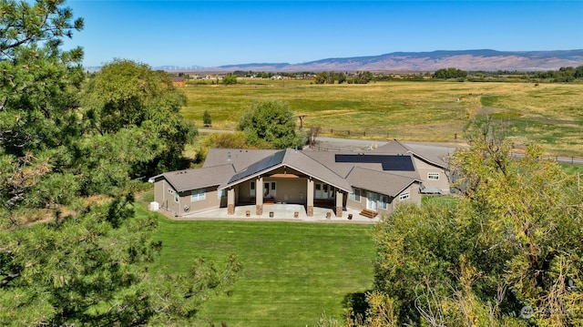 aerial view with a rural view and a mountain view