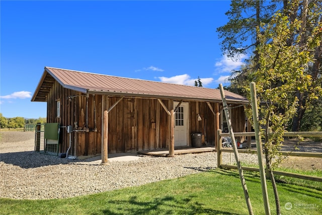 exterior space featuring an outbuilding