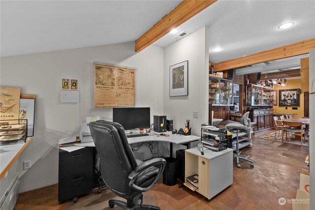 office space with vaulted ceiling with beams