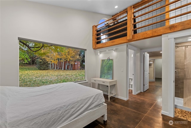 bedroom with a towering ceiling