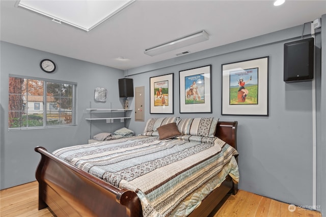 bedroom with light hardwood / wood-style floors