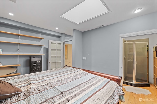 bedroom featuring light hardwood / wood-style flooring