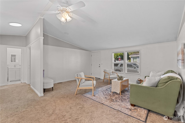 carpeted living room featuring vaulted ceiling and ceiling fan