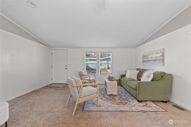 living room featuring vaulted ceiling and carpet floors