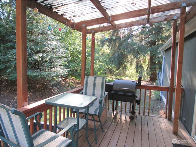 wooden deck with a pergola