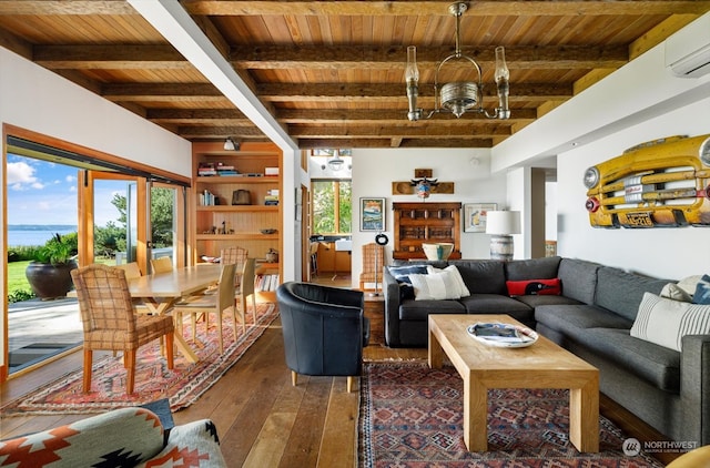 living room with wood ceiling, an AC wall unit, hardwood / wood-style floors, and a healthy amount of sunlight