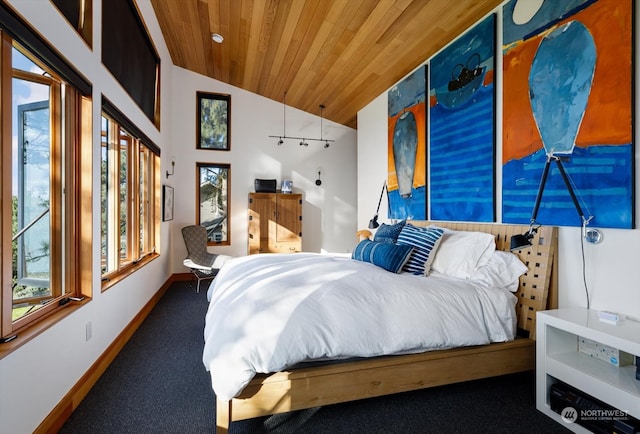 carpeted bedroom featuring wooden ceiling, baseboards, and lofted ceiling