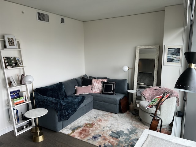 living room featuring dark hardwood / wood-style floors