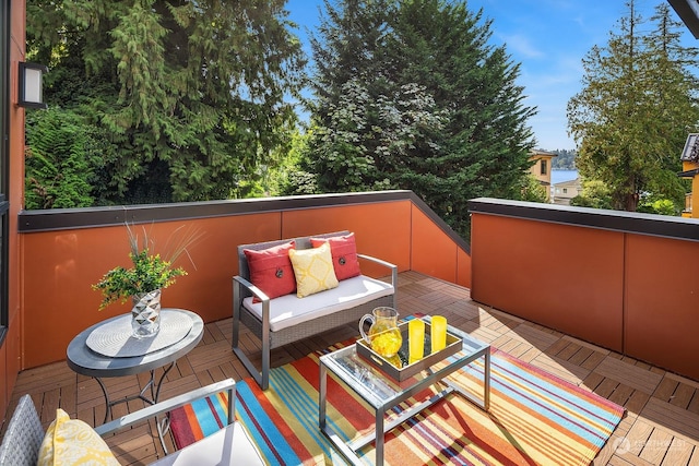 wooden deck featuring an outdoor living space