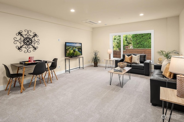 carpeted living room with recessed lighting, visible vents, and baseboards