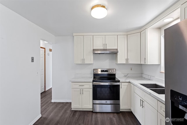 kitchen featuring white cabinets, sink, stainless steel appliances, and dark wood-type flooring