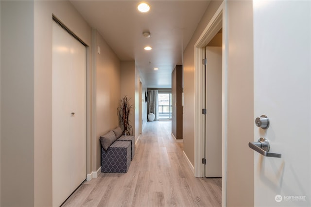 corridor featuring light hardwood / wood-style flooring