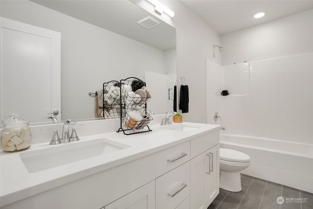 full bathroom featuring vanity, toilet, and shower / bath combination