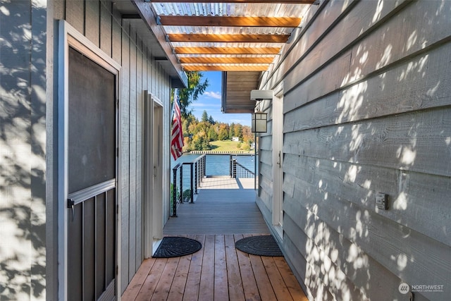 view of property exterior with a deck