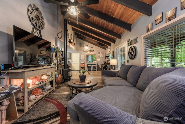 living room with high vaulted ceiling, ceiling fan with notable chandelier, beam ceiling, and wooden ceiling