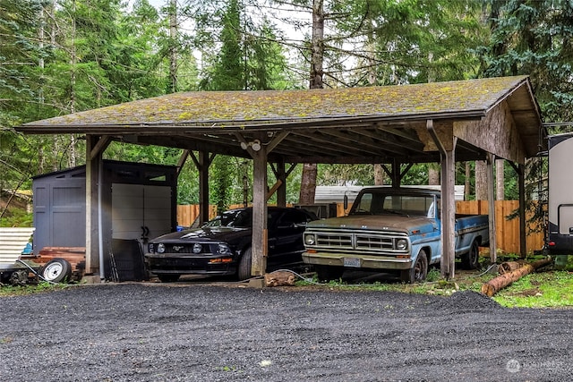 view of vehicle parking with a carport