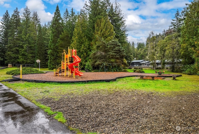 view of play area featuring a lawn