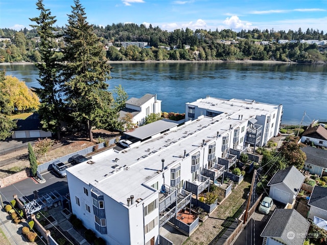 bird's eye view with a water view