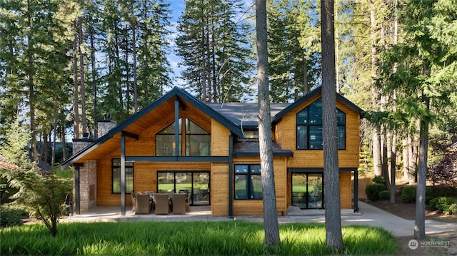 back of house featuring a patio