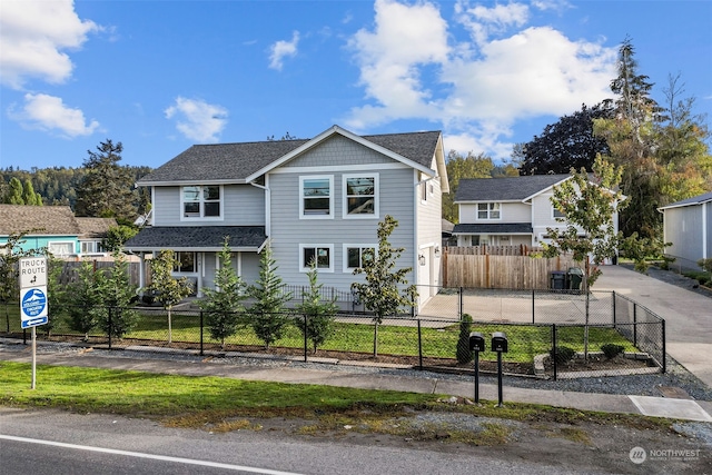 view of front of property featuring a garage