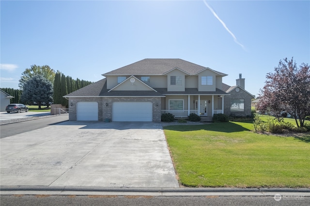 view of property with a front yard and a porch