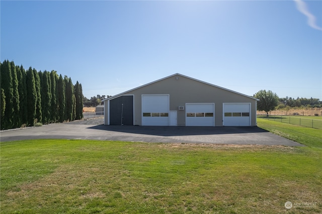 garage with a lawn